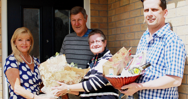 Locals welcome residents to their new home